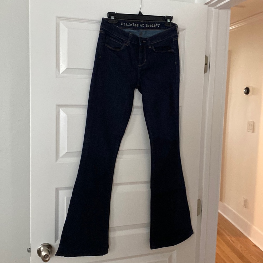 Dark denim articles of society jeans